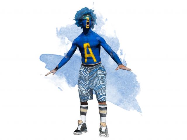 A ֱ fan sports blue body paint and a blue wig to support the Aggies